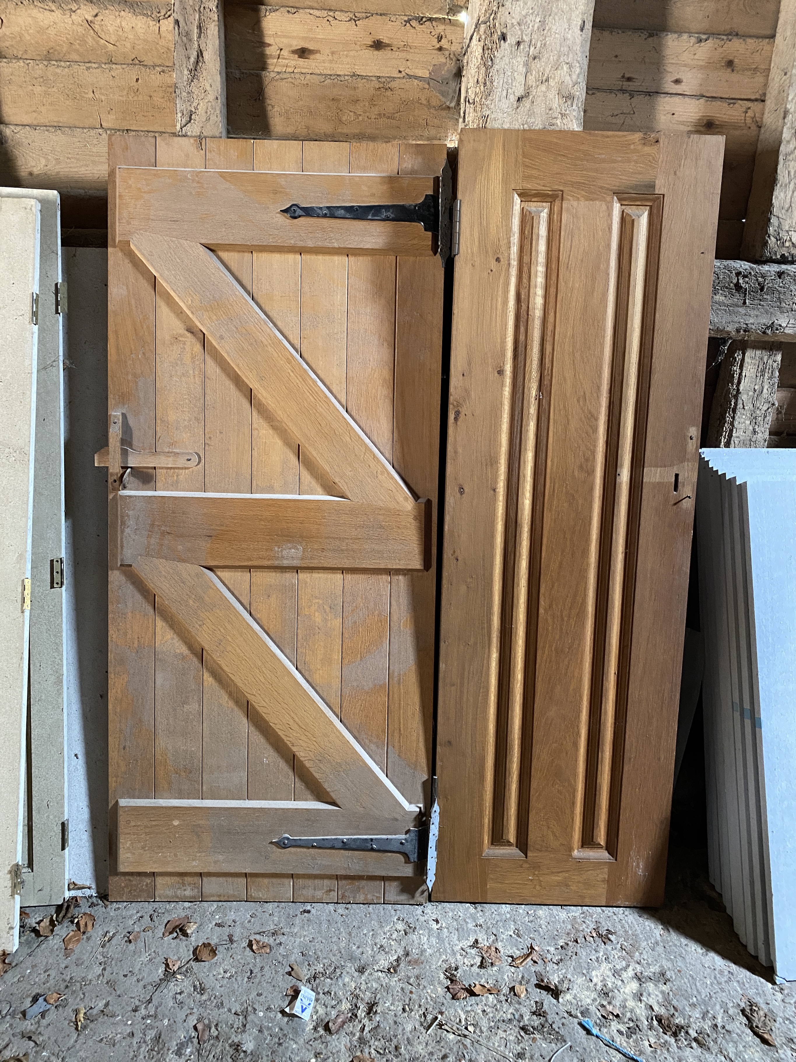 Four panelled solid oak doors, 210 x 86.5cm; 200 x 62.5cm; 171 x 63.5cm and 72 x 63.5cm